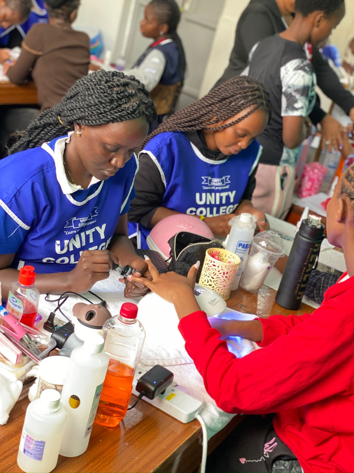 Nail technology students in practical training